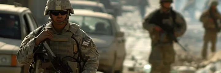 Soldiers walk through the ruins