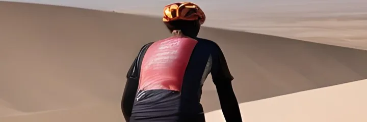 A cyclist in the desert